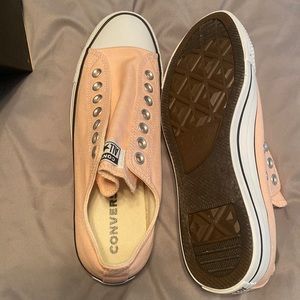 Slip on converse sneakers.